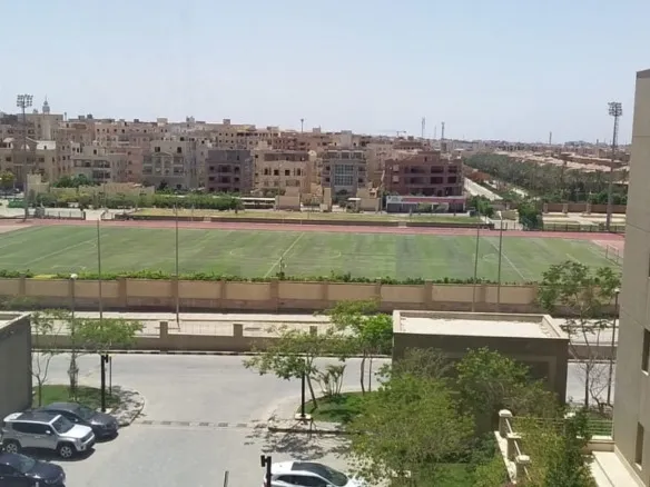 View over Flowers Club from third floor apartment for sale in The Village Palm Hills New Cairo