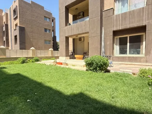 Private 35 sqm garden of ground floor apartment for sale in The Village Palm Hills New Cairo
