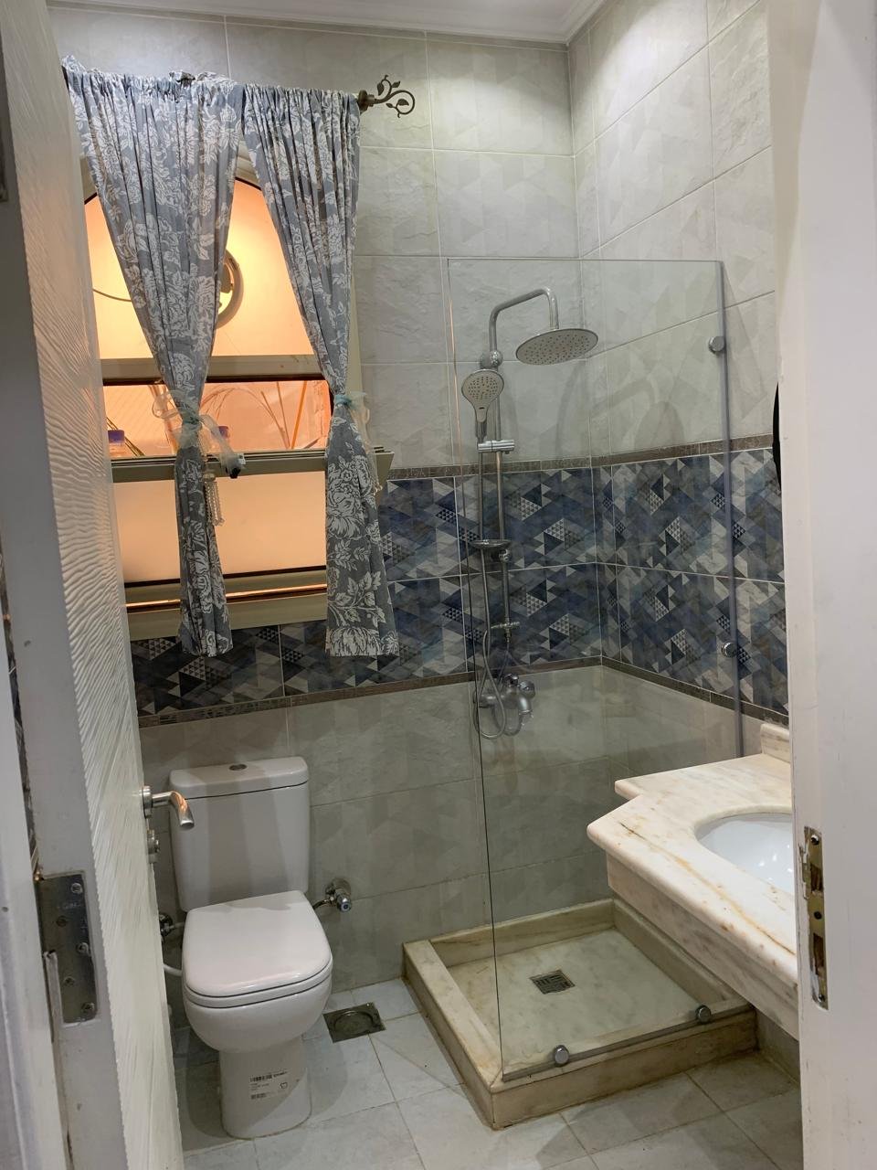 Master bathroom with glass shower, Emerald Park villa
