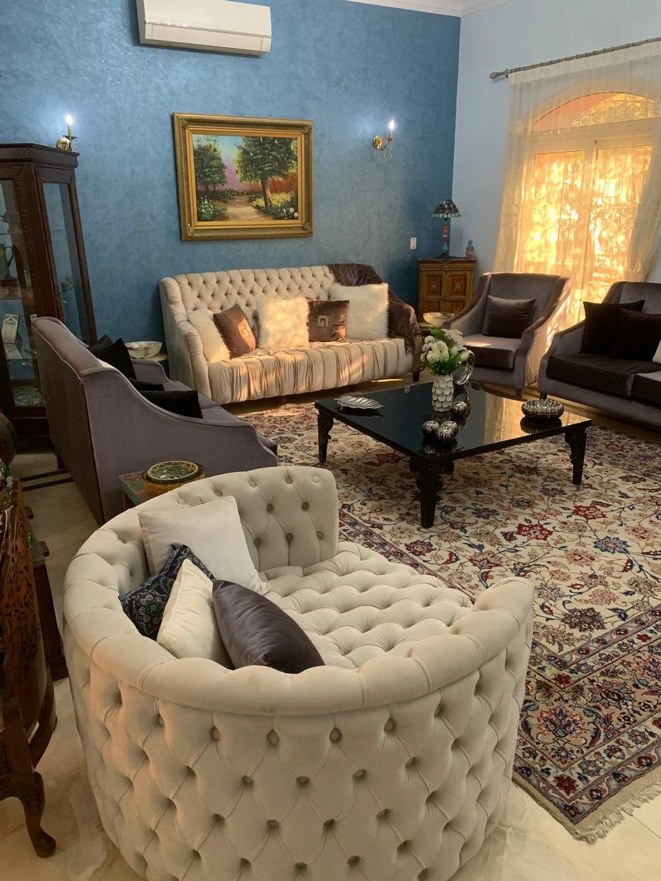 Furnished living room with garden view, Emerald Park twin villa