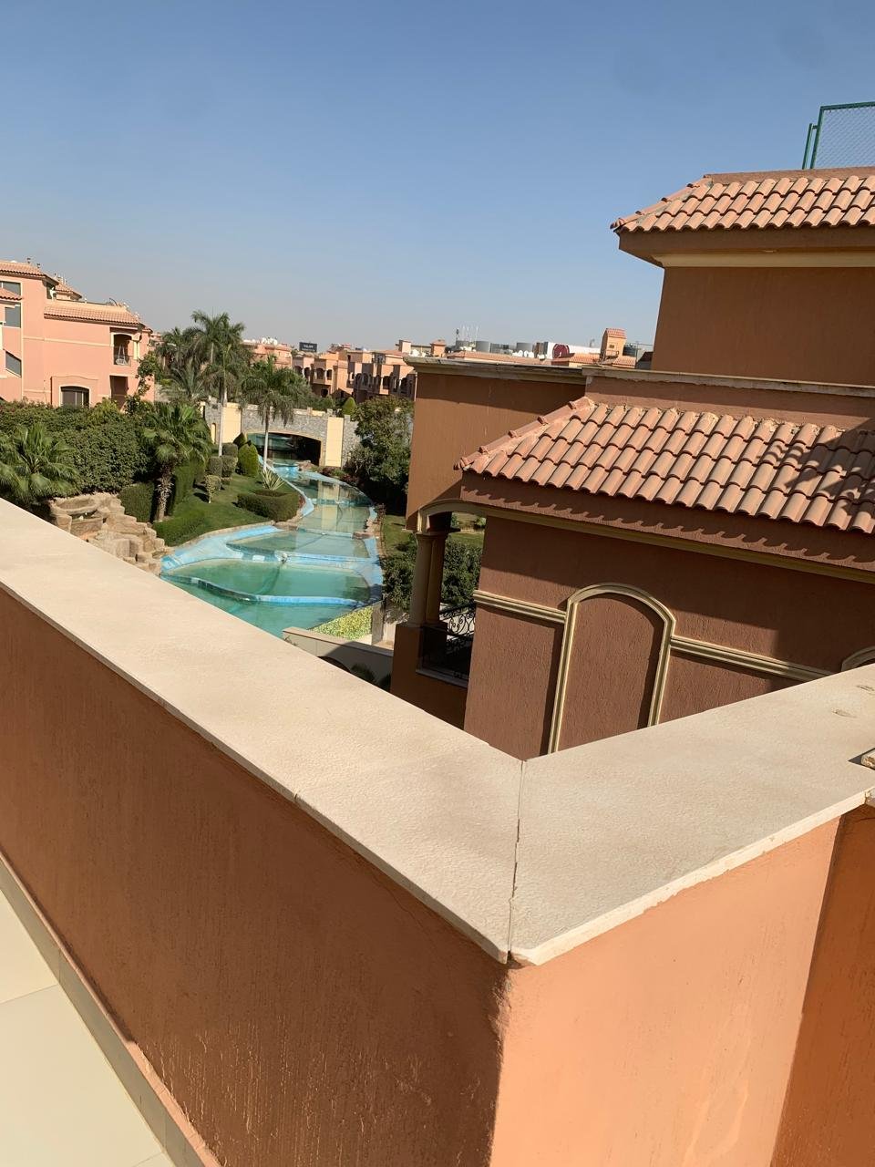 Roof terrace with shared pool view, Emerald Park New Cairo