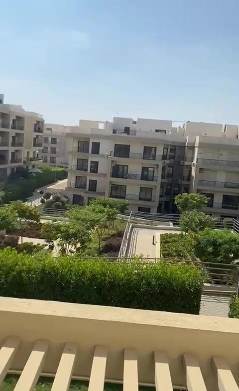 Balcony railing overlooking the garden - apartment in Fifth Square, New Cairo
