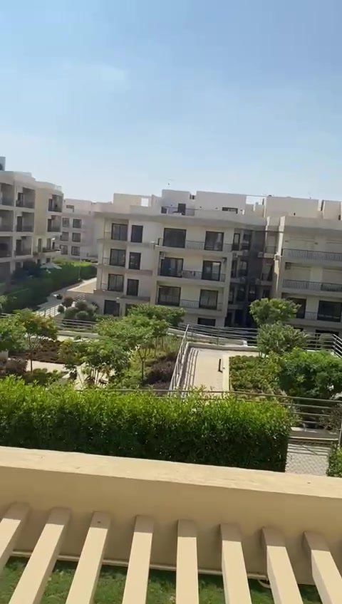 Balcony railing overlooking the garden - apartment in Fifth Square, New Cairo