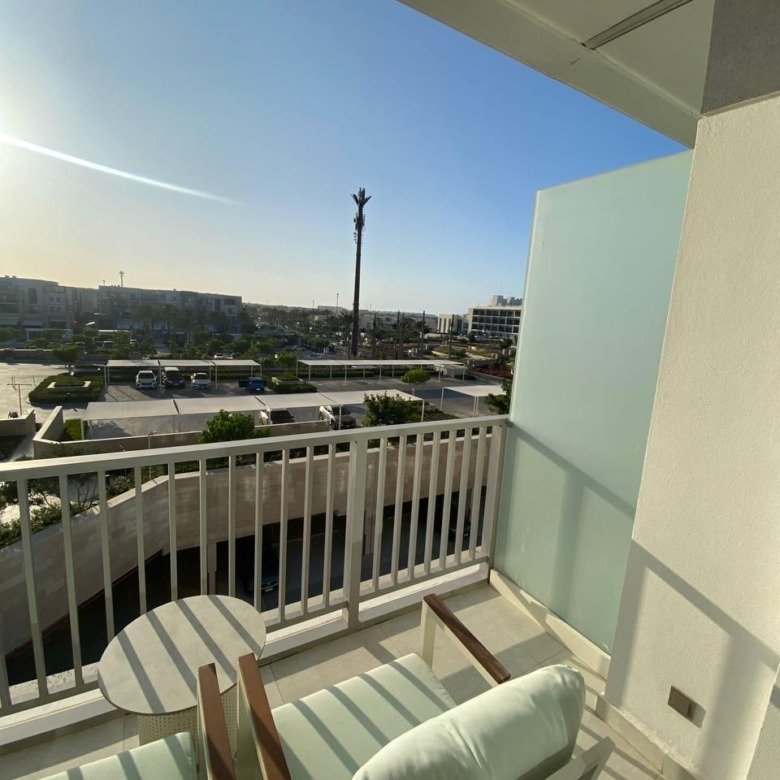 Balcony view over landscaped grounds in Vida Marassi