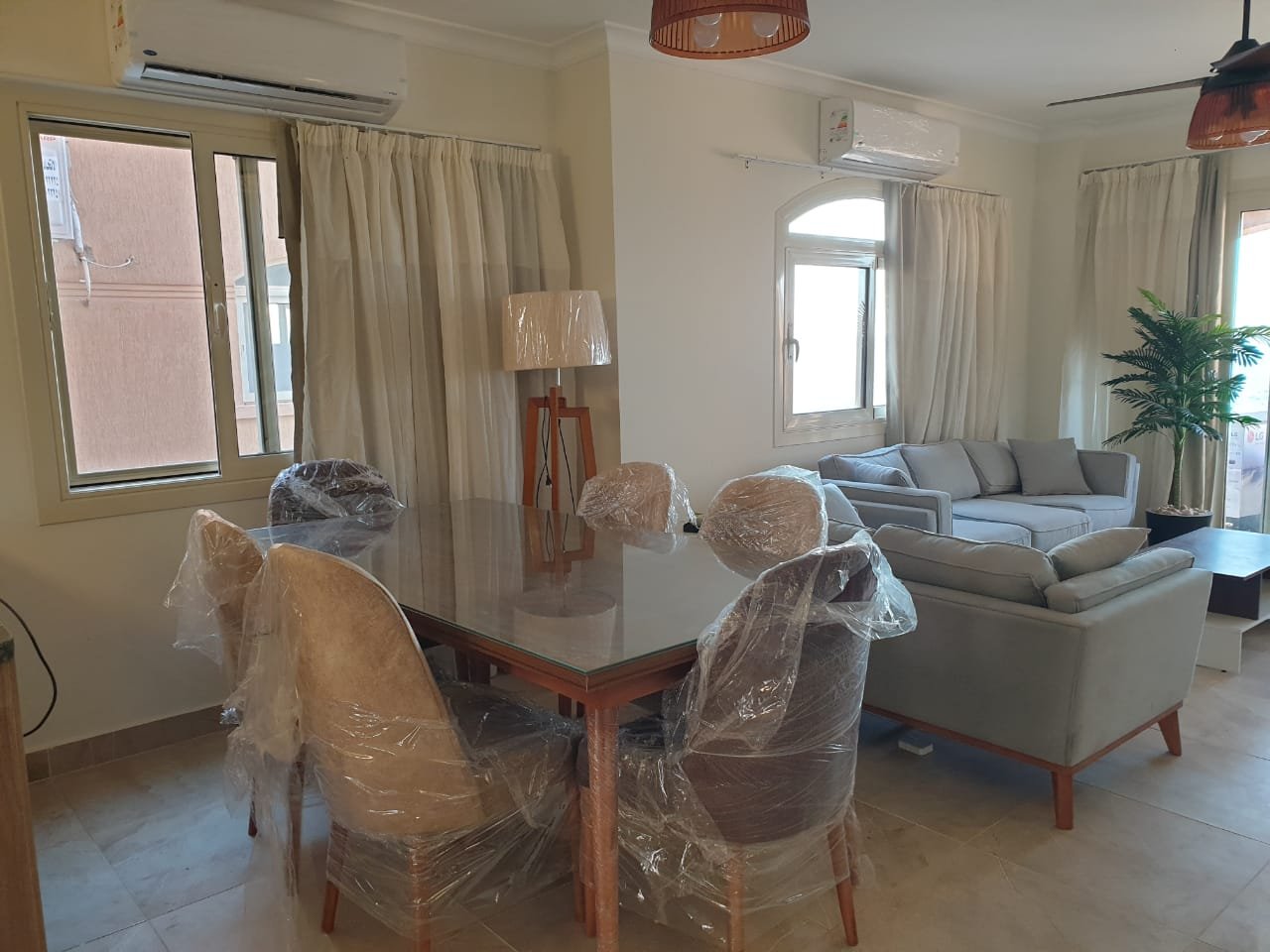 villa-for-rent-telal-ain-sokhna-160-sqm-dining Dining table beside the sitting area - villa in Telal, Ain Sokhna