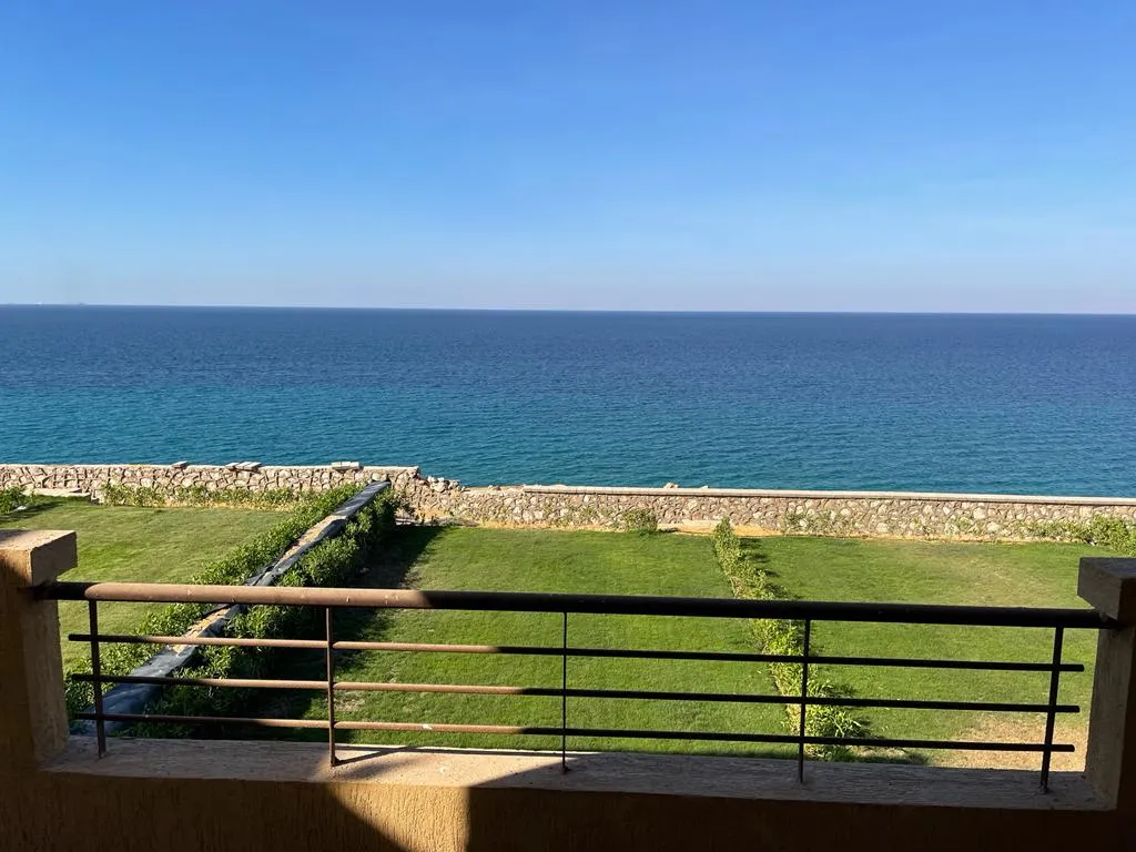 Sea view over the garden from the balcony - villa in Telal, Ain Sokhna